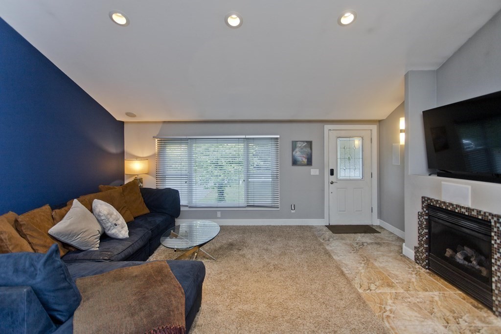 98 Greenwich Road Ware, MA 01082 - Photo 8 of 22 a living room with furniture and a flat screen tv