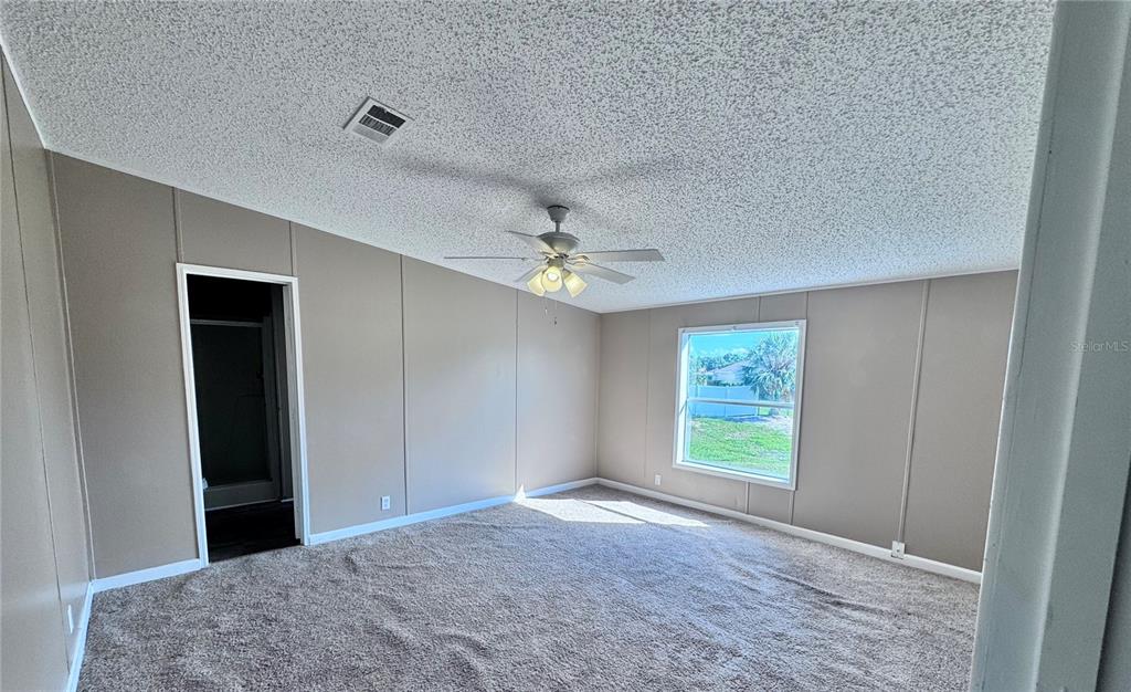 4300 Meadow Ridge Avenue Mulberry, FL 33860 - Photo 16 of 25 a view of an empty room with a window