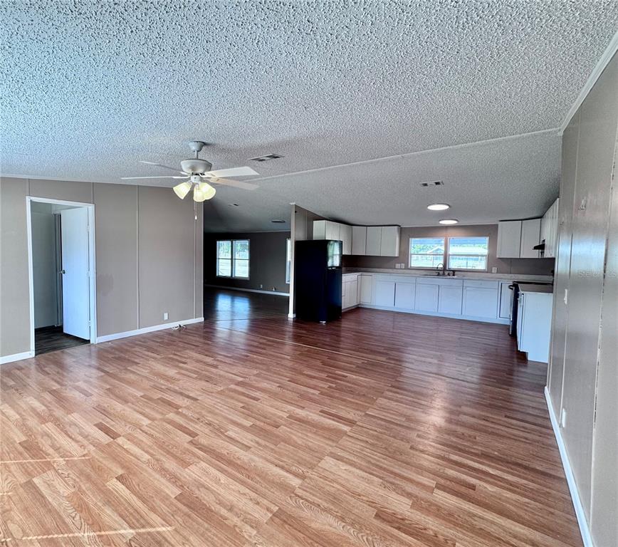 4300 Meadow Ridge Avenue Mulberry, FL 33860 - Photo 5 of 25 a view of a kitchen with a sink and a kitchen counter