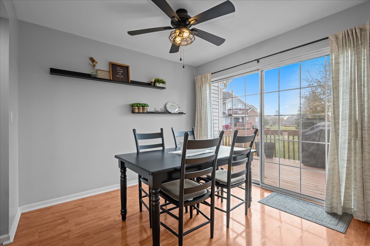 8 Ione Drive, Unit C South Elgin, IL 60177 - Photo 12 of 31 a view of a dining room with furniture window and outside view