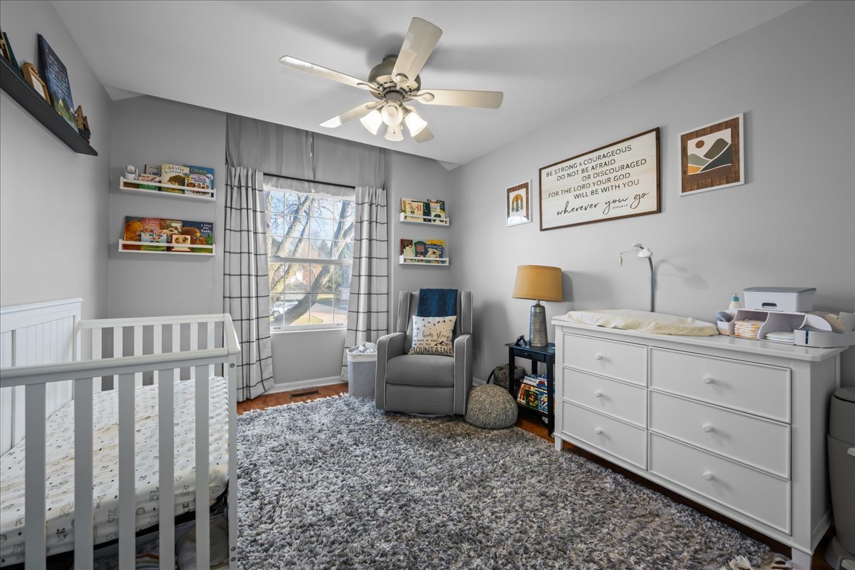 8 Ione Drive, Unit C South Elgin, IL 60177 - Photo 18 of 31 a bedroom with furniture and window
