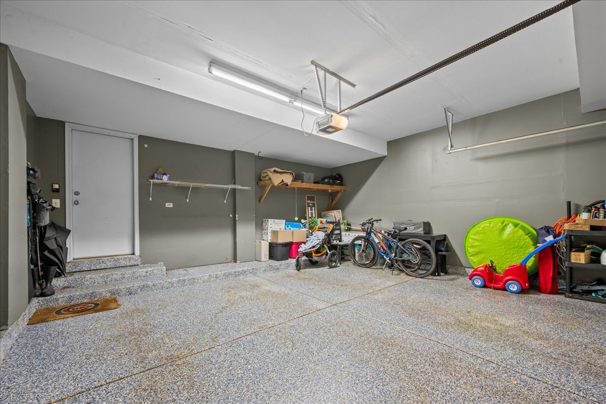 8 Ione Drive, Unit C South Elgin, IL 60177 - Photo 24 of 31 a view of a garage with toys