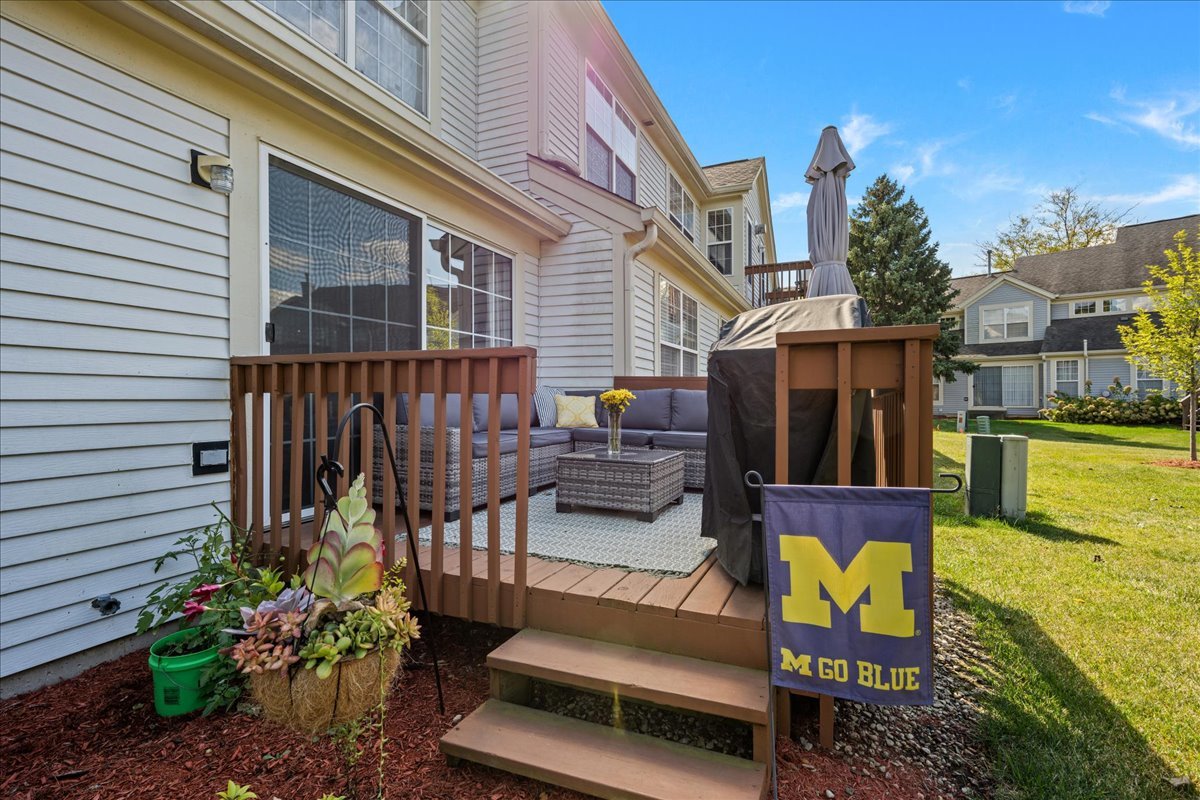 8 Ione Drive, Unit C South Elgin, IL 60177 - Photo 26 of 31 a view of a patio with couches chairs and potted plants