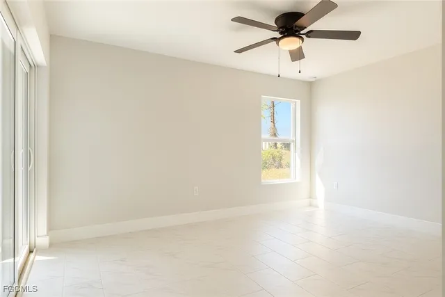 en view of an empty room with a window