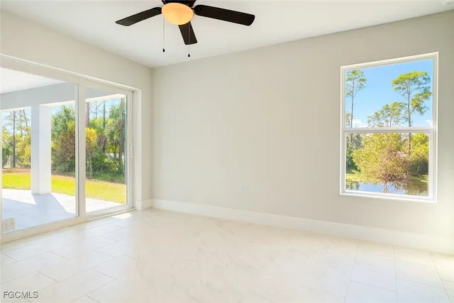 a bathroom with a toilet sink and shower