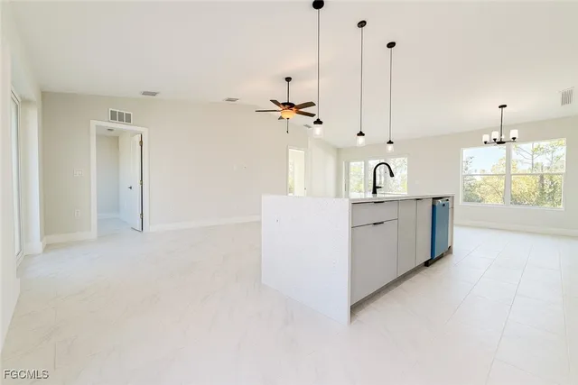 a view of a kitchen with a sink