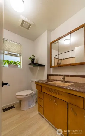 a bathroom with a toilet