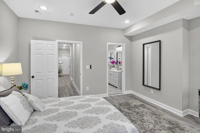 a bedroom with a bed and a cabinets