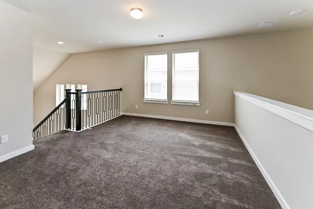 a view of a livingroom with a staircase