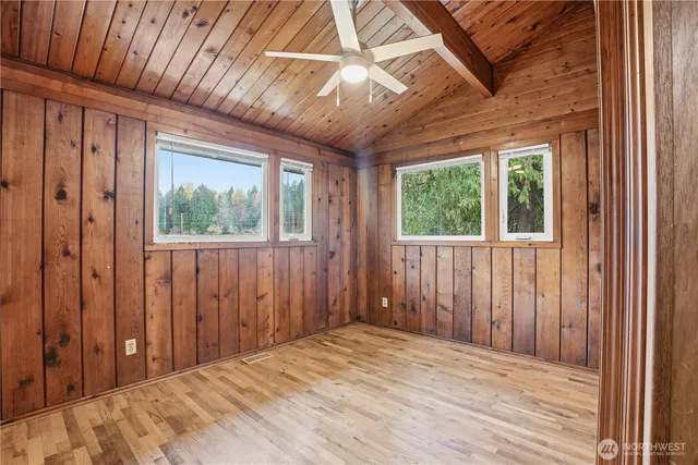 a view of a room with a large window