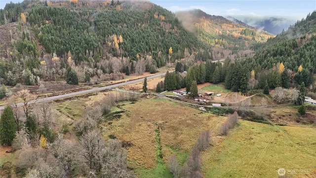 a view of a backyard of the house