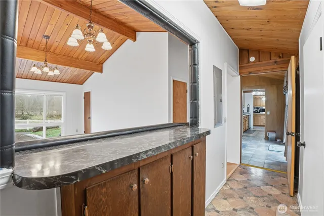 a kitchen with a sink and a window