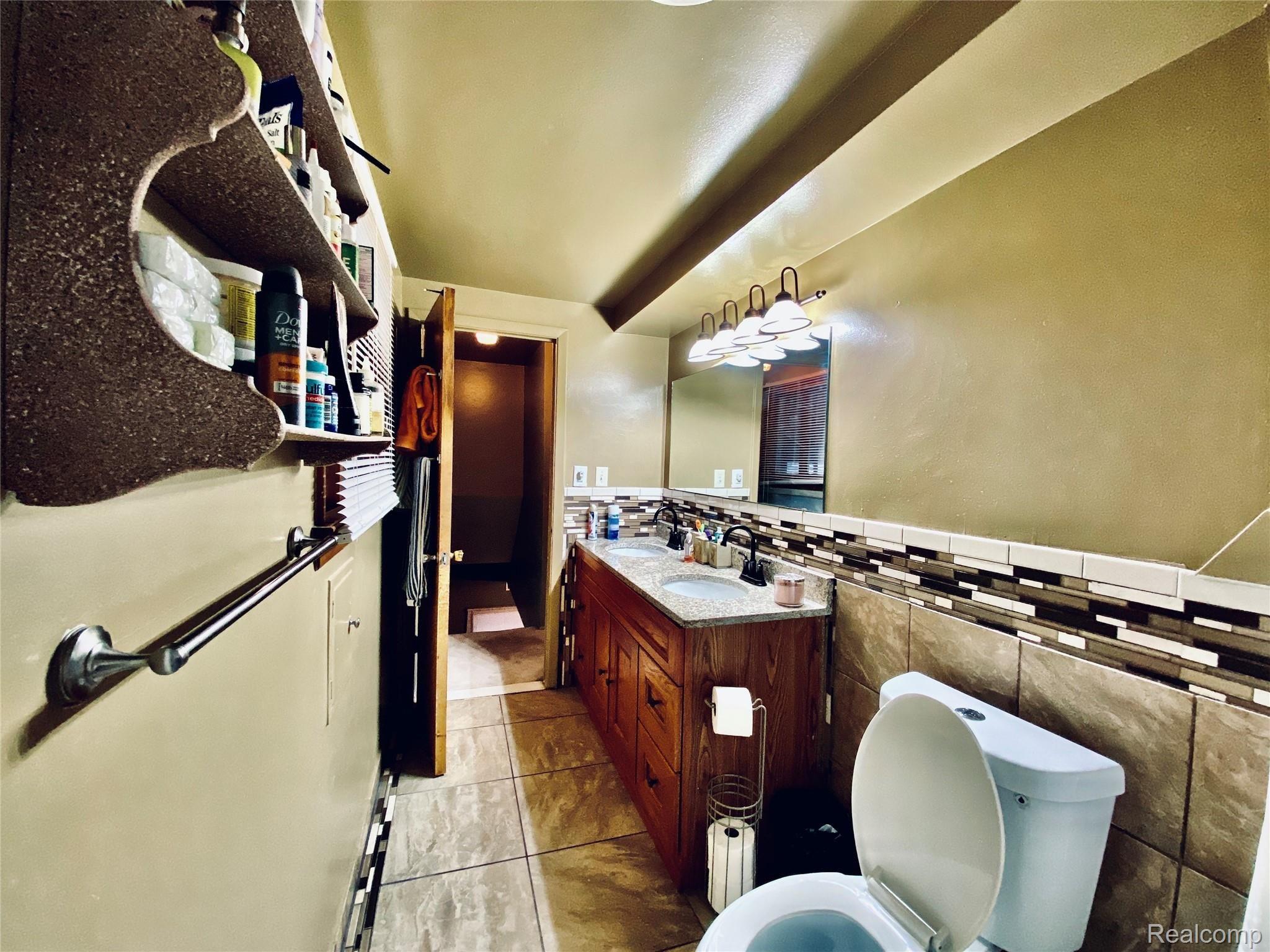 18484 Davidson Road Fraser, MI 48026 - Photo 23 of 45 Upstairs Bathroom Looking out.JPG