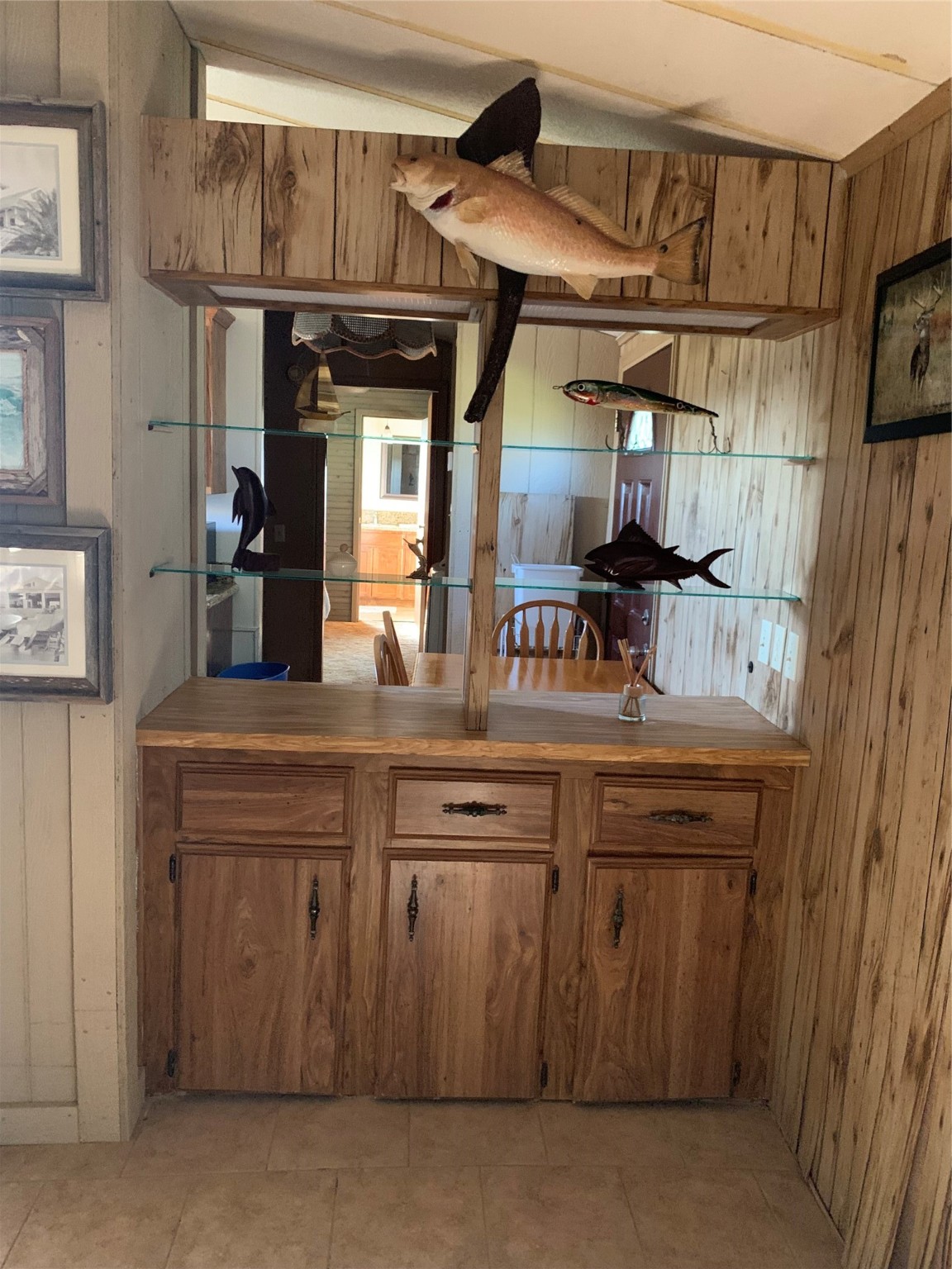 911 15th Street Port O'Connor, TX 77982 - Photo 12 of 22 a kitchen with stainless steel appliances granite countertop a sink and cabinets
