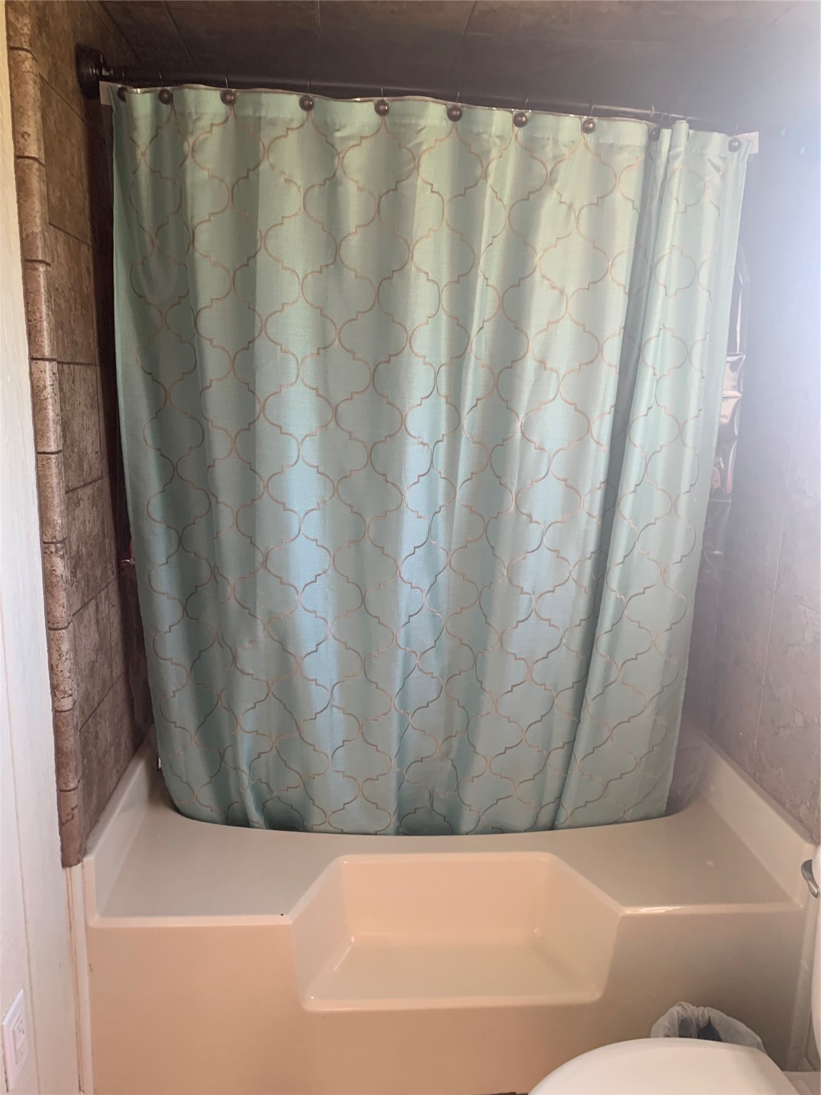 911 15th Street Port O'Connor, TX 77982 - Photo 16 of 22 a bathroom with a bathtub and shower