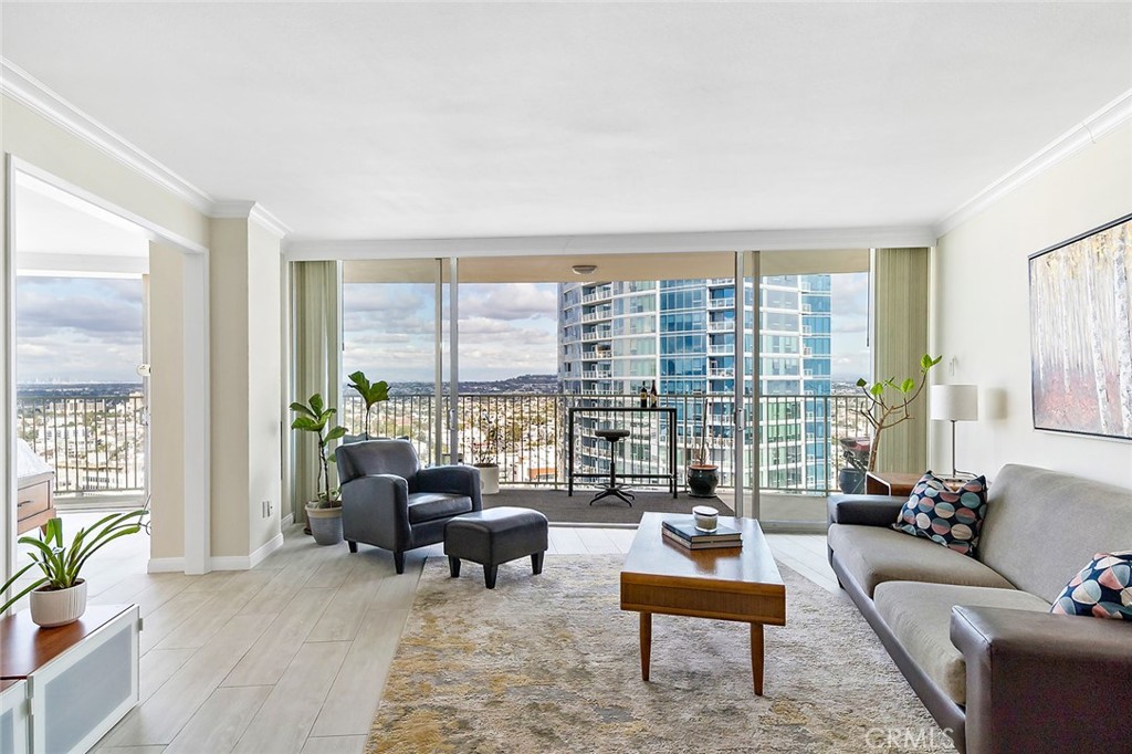 700 East Ocean Boulevard, Unit 3003 Long Beach, CA 90802 - Photo 3 of 39 a living room with furniture and a large window