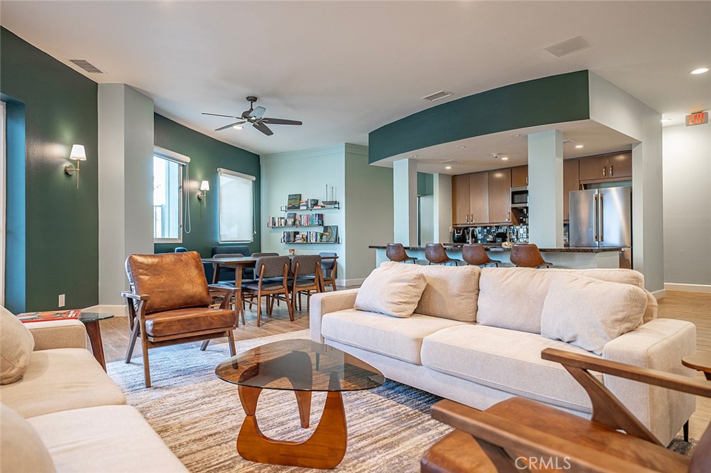 700 East Ocean Boulevard, Unit 3003 Long Beach, CA 90802 - Photo 34 of 39 a living room with furniture and wooden floor
