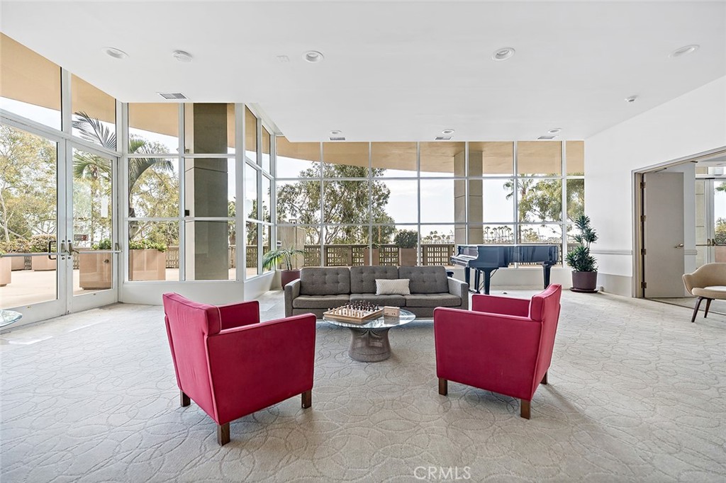 700 East Ocean Boulevard, Unit 3003 Long Beach, CA 90802 - Photo 36 of 39 a living room with furniture and a floor to ceiling window