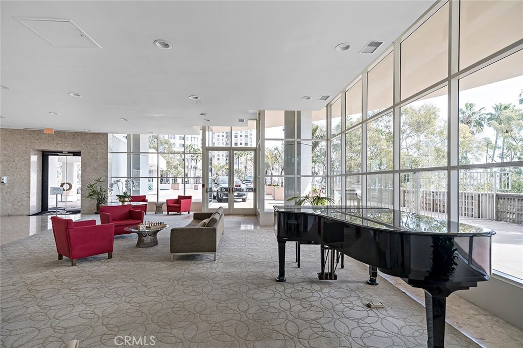 700 East Ocean Boulevard, Unit 3003 Long Beach, CA 90802 - Photo 37 of 39 a living room with furniture large window and a table