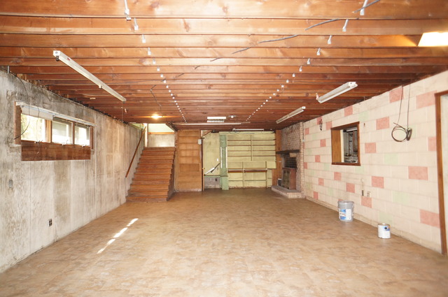 4S943 West County Line Road Big Rock, IL 60511 - Photo 11 of 24 a view of a room with wooden walls