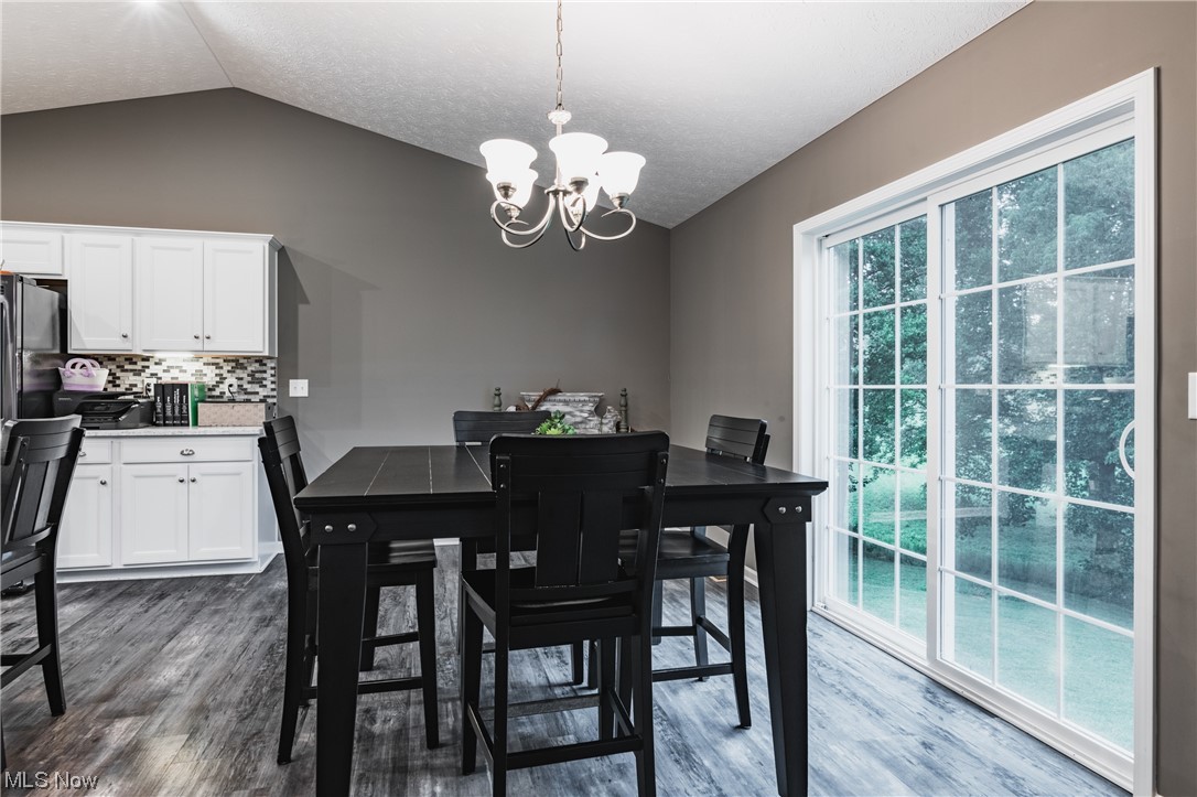 2545 Layman Road Vincent, OH 45784 - Photo 9 of 32 Hardwood floored dining room with vaulted ceiling