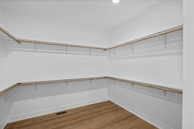 a view of an empty walk in closet
