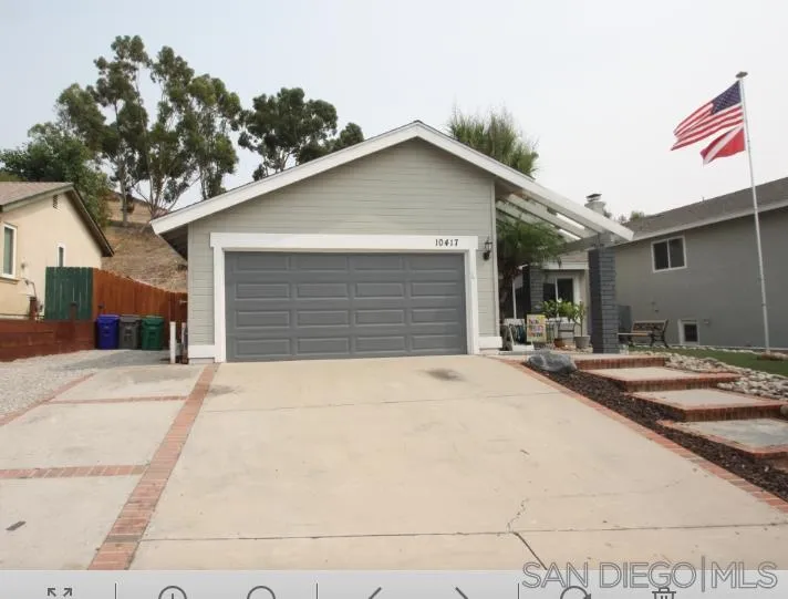 10417 Cadwell Road Santee, CA 92071 - Photo 11 of 12 a white house with a outdoor space