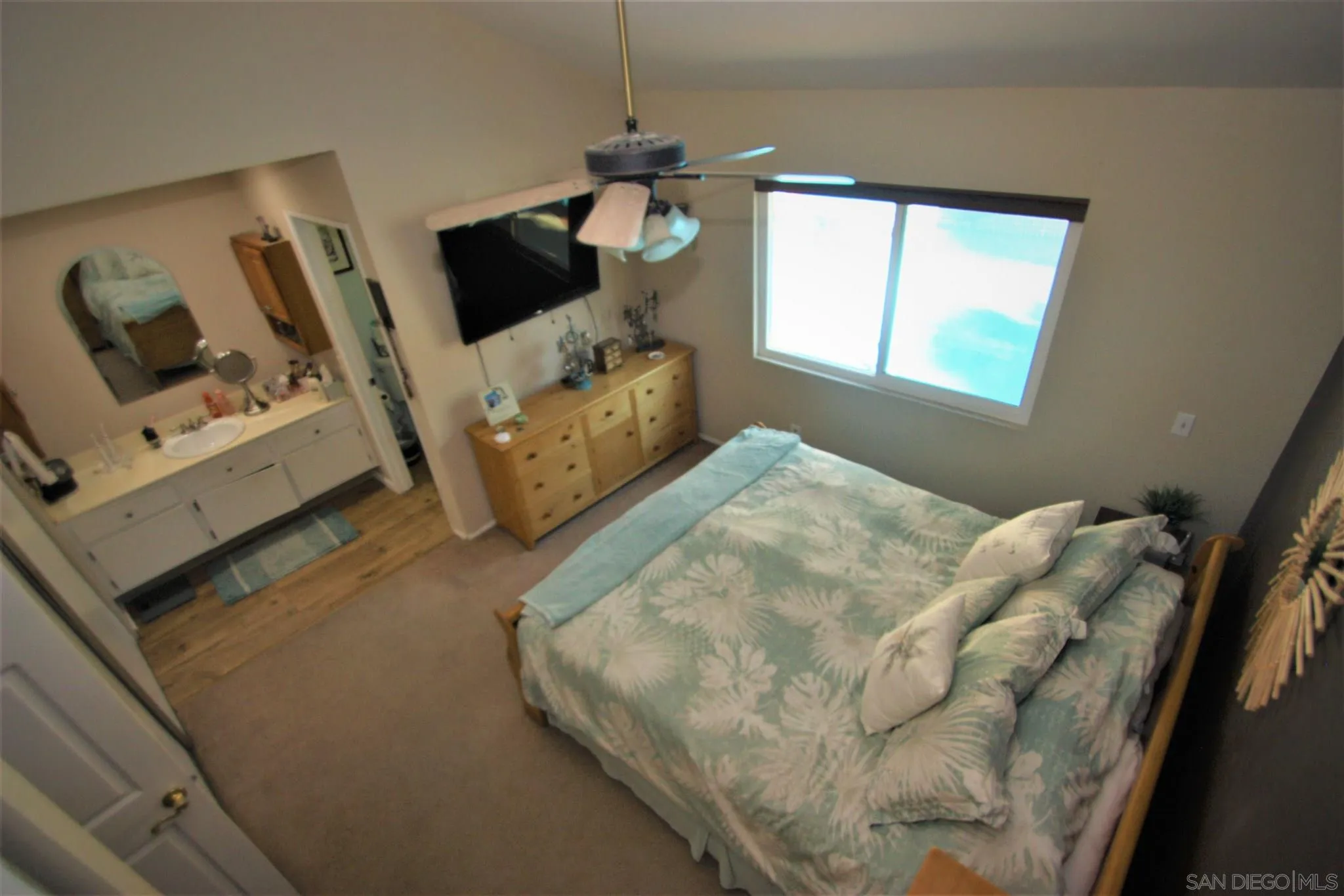 10417 Cadwell Road Santee, CA 92071 - Photo 5 of 12 a bedroom with furniture and flat screen tv