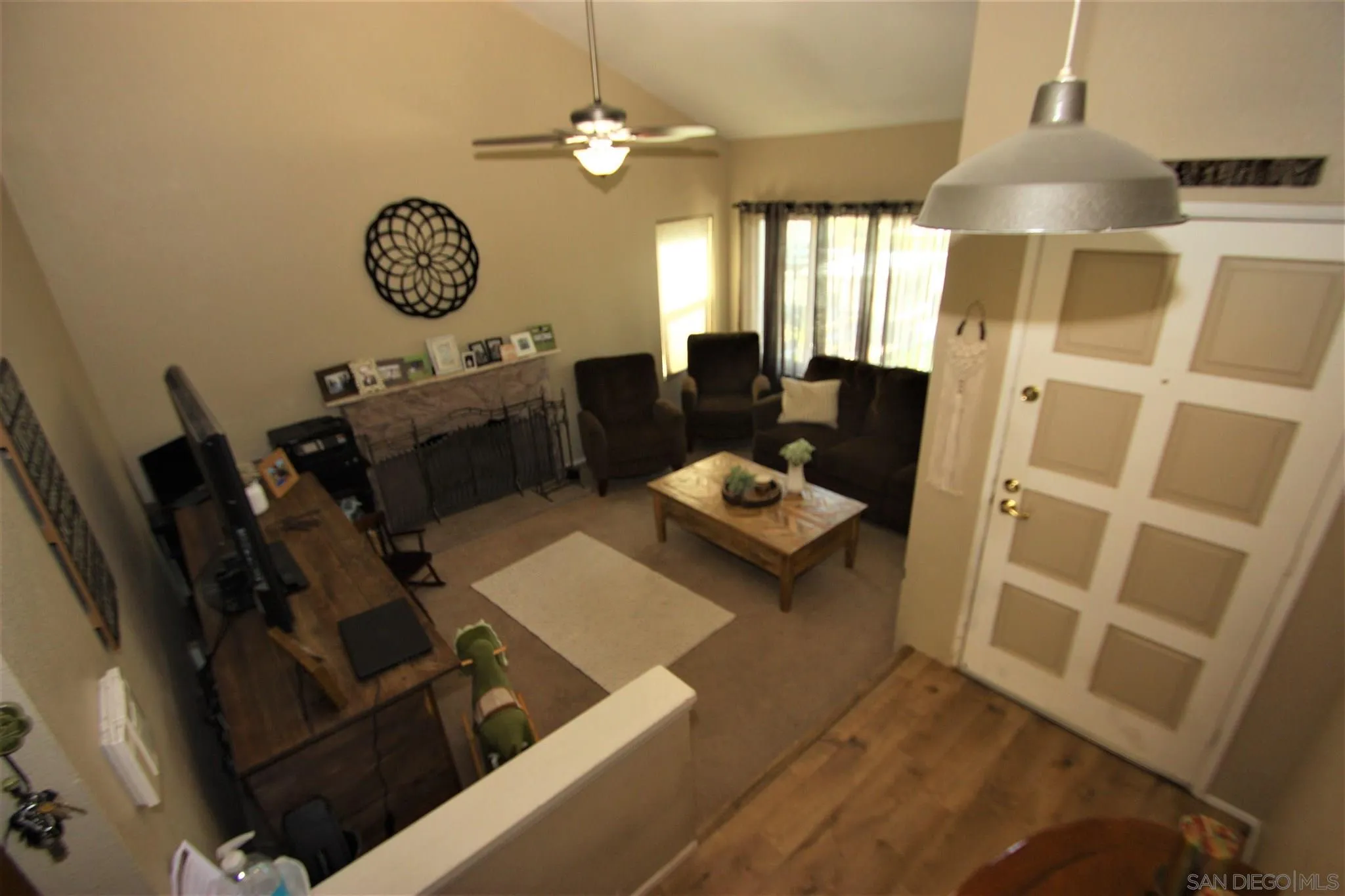 10417 Cadwell Road Santee, CA 92071 - Photo 8 of 12 a living room with furniture and a window