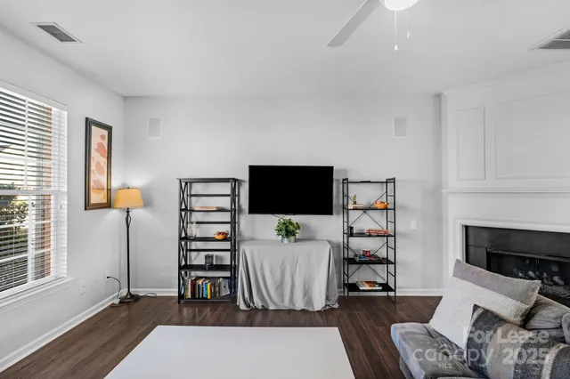 a room with furniture and a flat screen tv