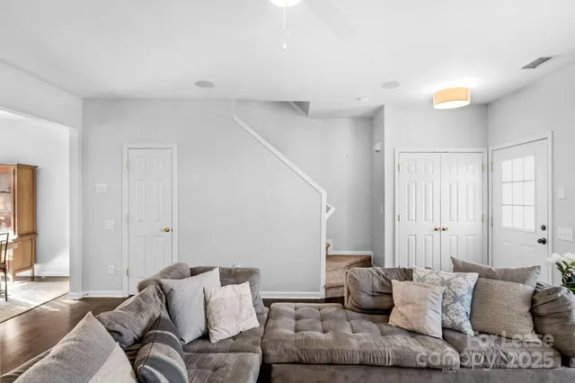 a living room with furniture and a couch