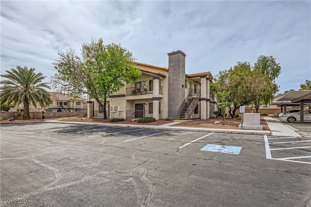 1575 West Warm Springs Road, Unit 1613 Henderson, NV 89014 - Photo 3 of 39 View of uncovered parking lot