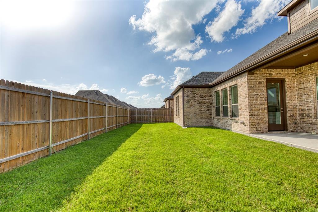 225 Cisco Trail Forney, TX 75126 - Photo 28 of 28 a view of a backyard with a garden