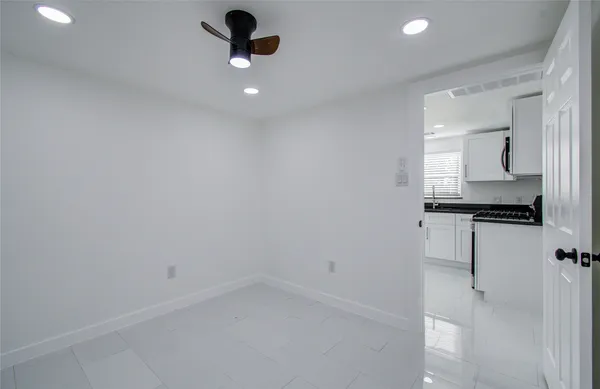 a view of kitchen and microwave