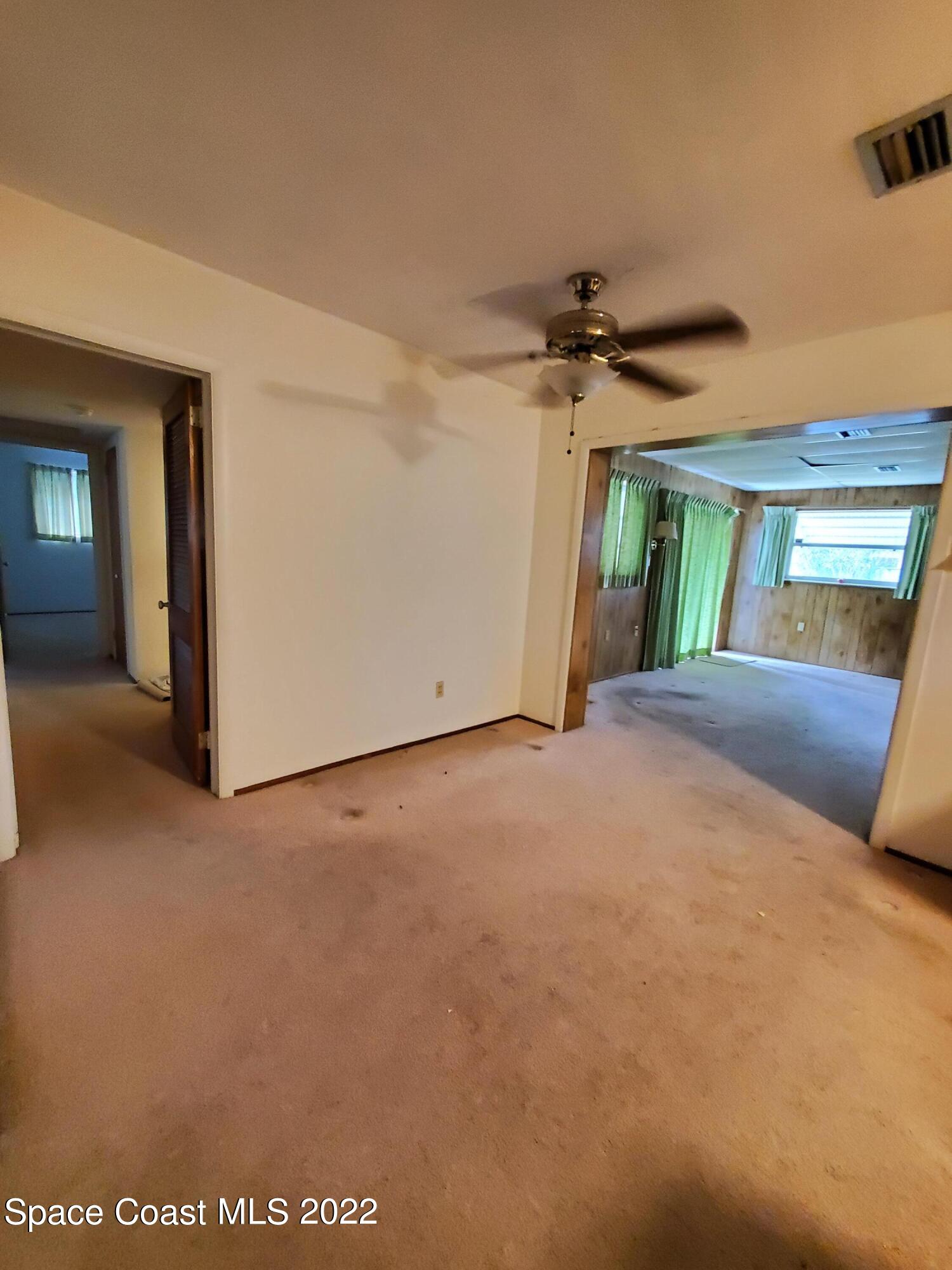 1507 Emory Lane Cocoa, FL 32922 - Photo 20 of 57 a view of an empty room with a window