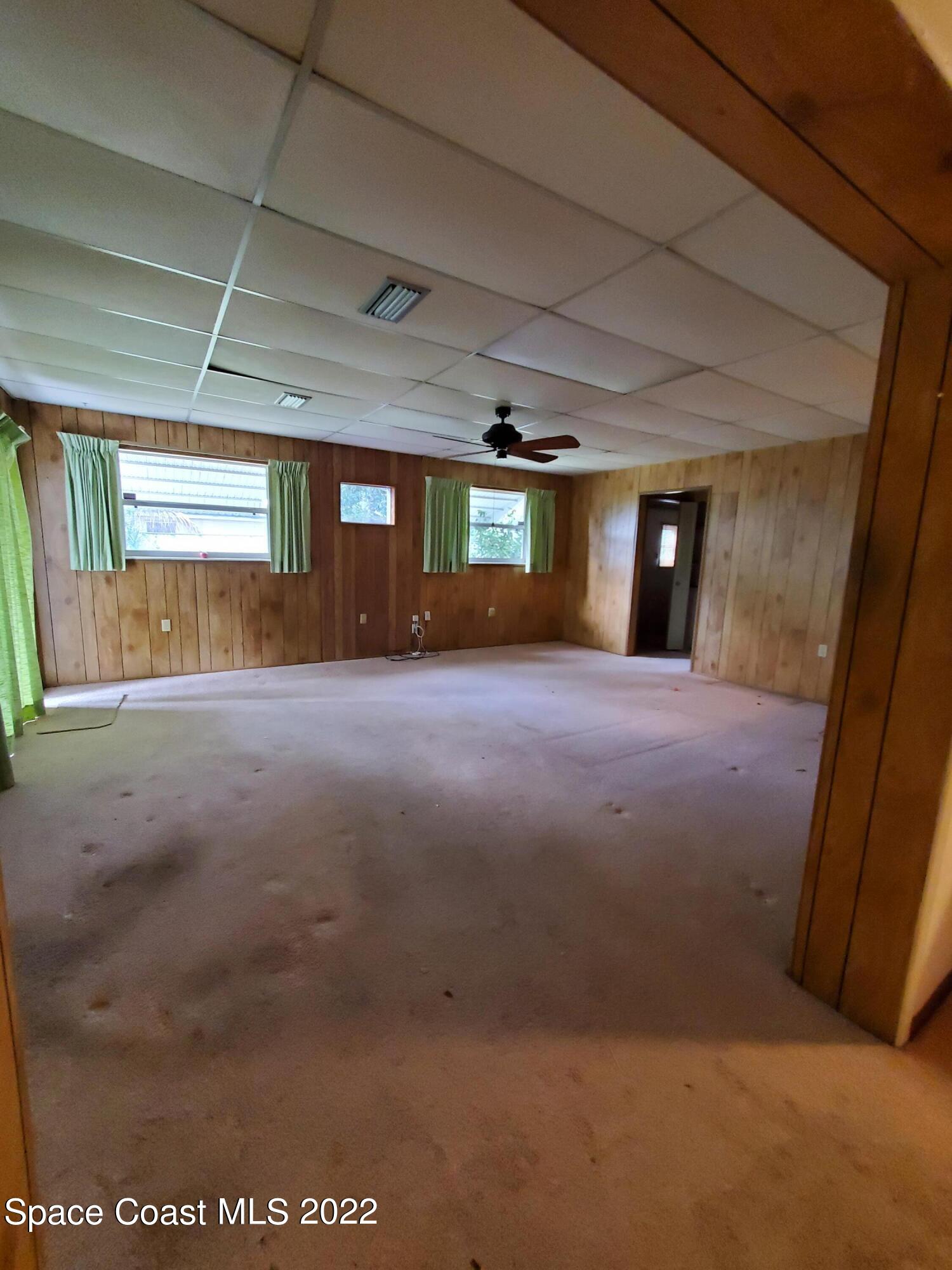 1507 Emory Lane Cocoa, FL 32922 - Photo 22 of 57 a view of an empty room with a fireplace