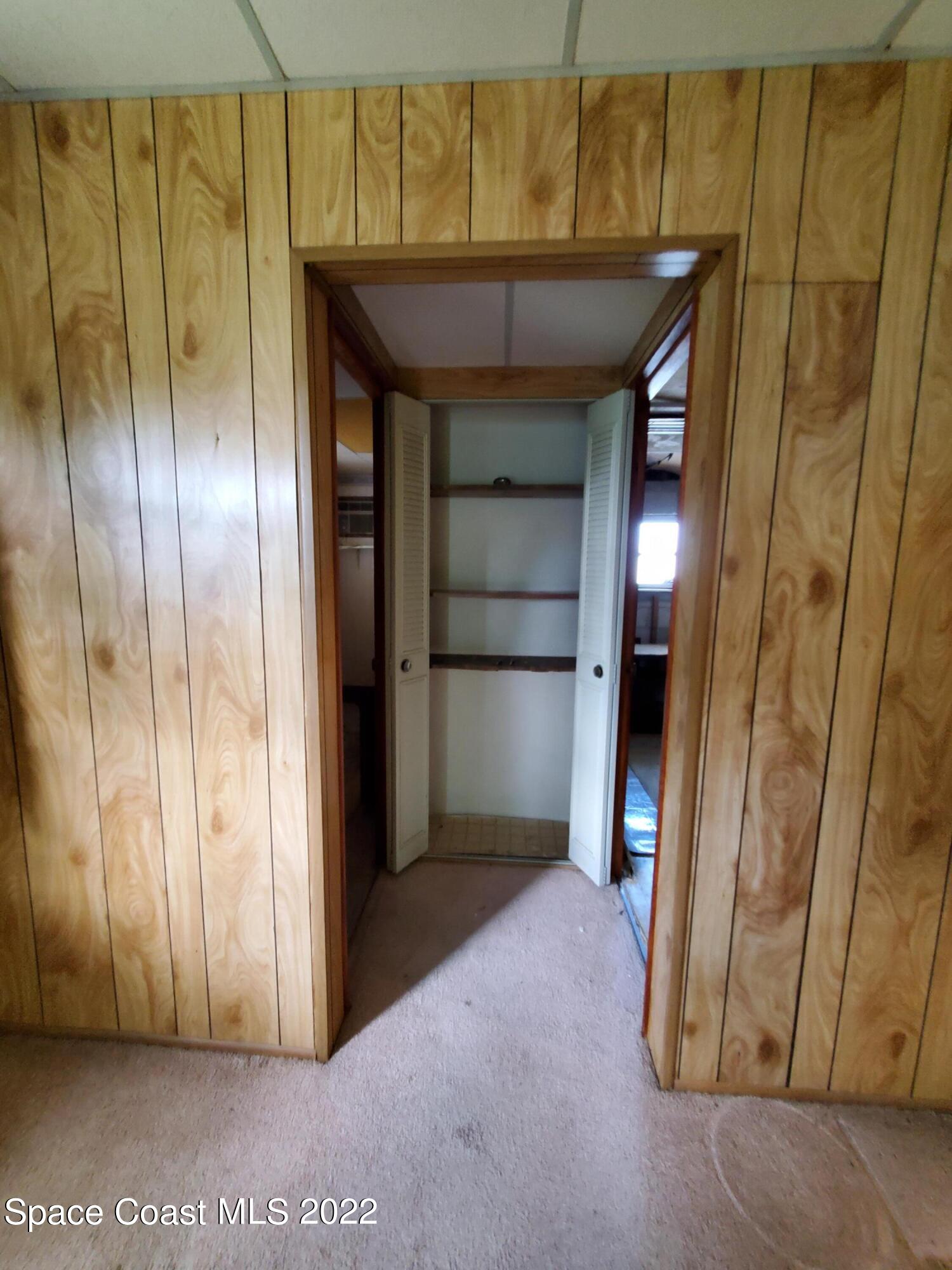 1507 Emory Lane Cocoa, FL 32922 - Photo 24 of 57 a view of elevator with hallway