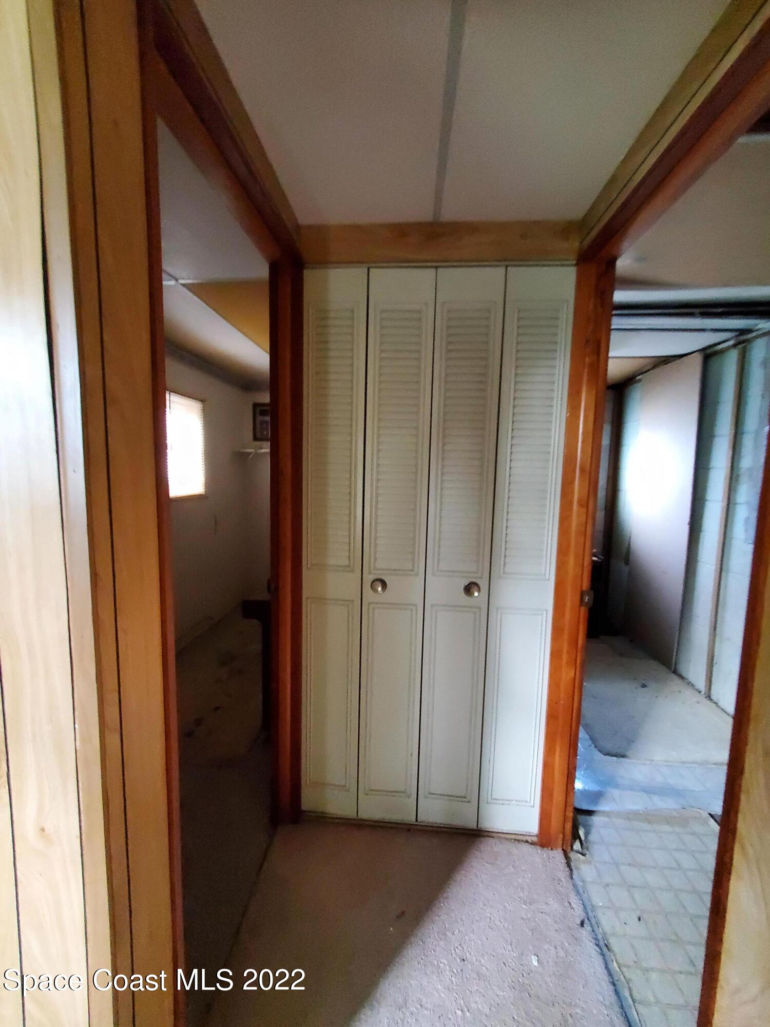 1507 Emory Lane Cocoa, FL 32922 - Photo 25 of 57 a view of a hallway with wooden floor