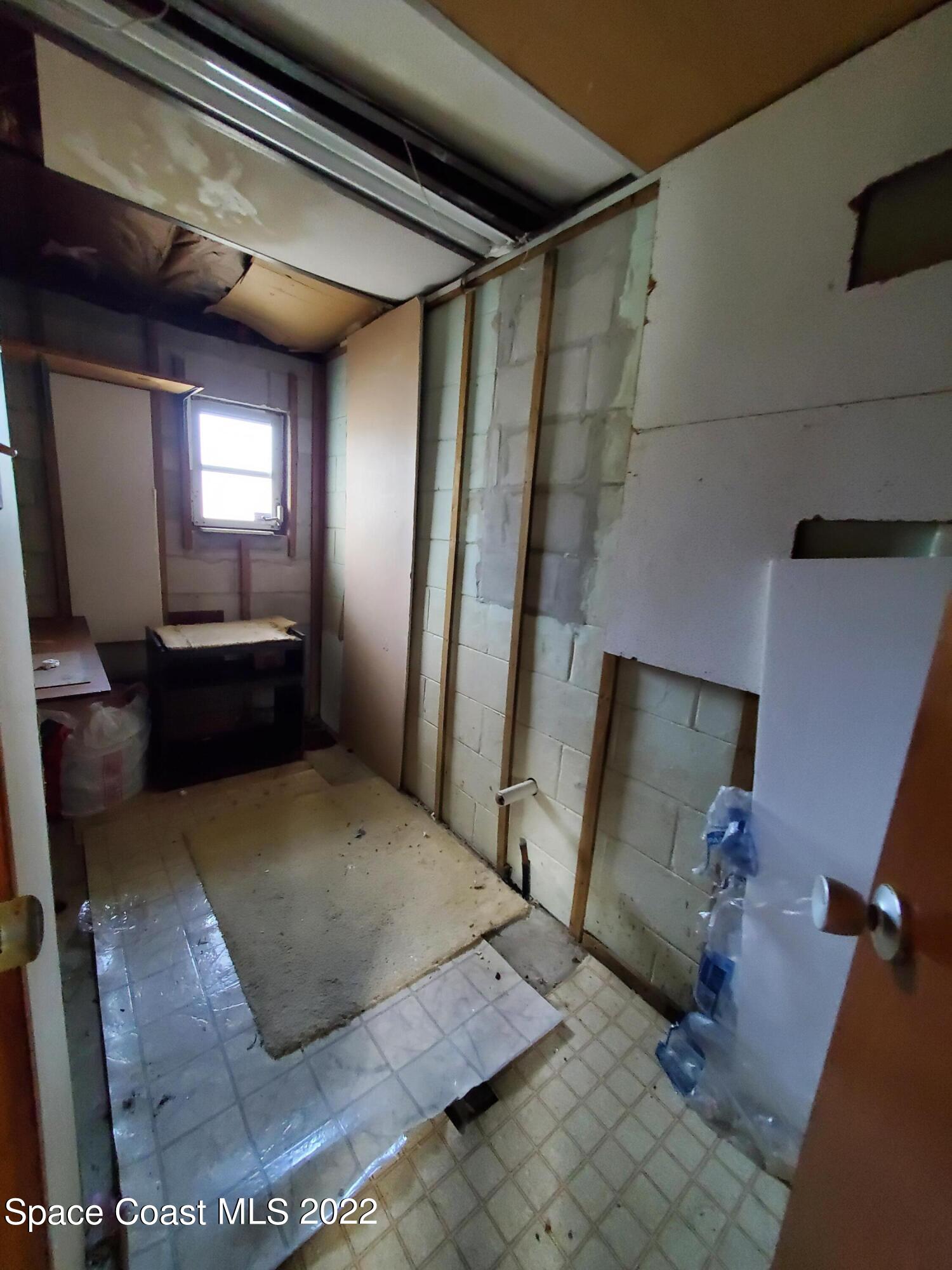 1507 Emory Lane Cocoa, FL 32922 - Photo 26 of 57 a view of a hallway with workspace