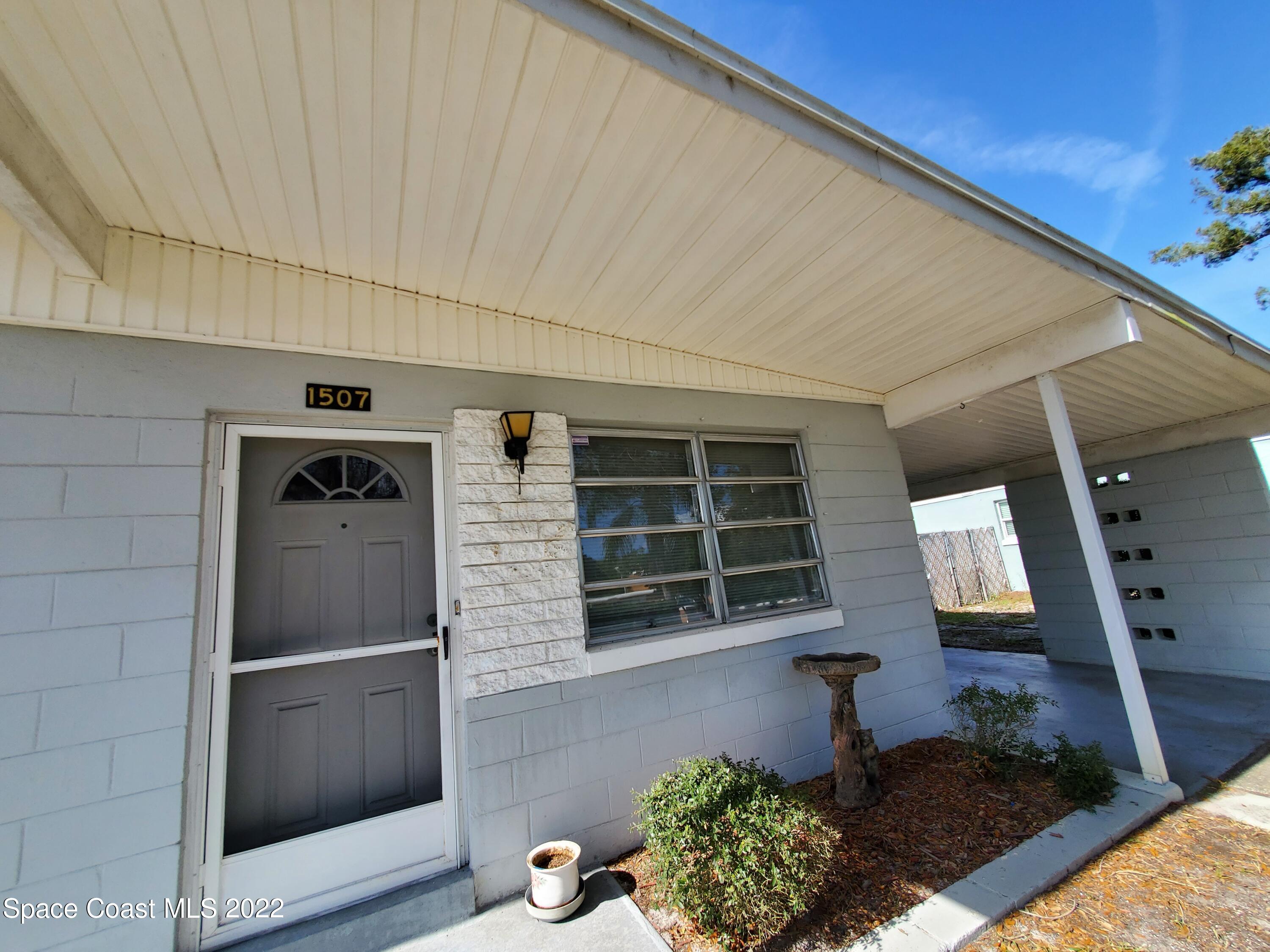 1507 Emory Lane Cocoa, FL 32922 - Photo 3 of 57 a front view of a house