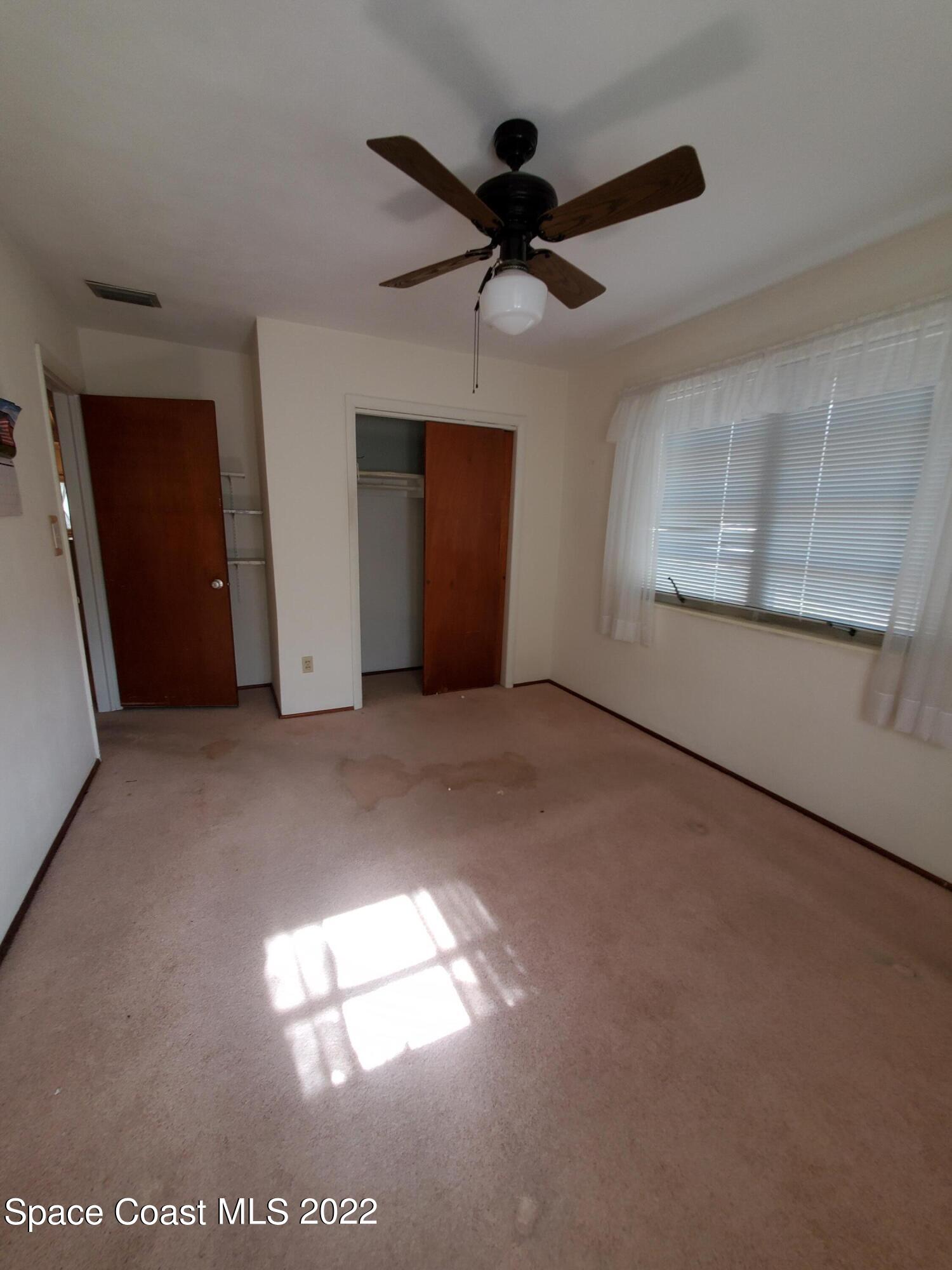 1507 Emory Lane Cocoa, FL 32922 - Photo 31 of 57 a view of empty room with ceiling fan