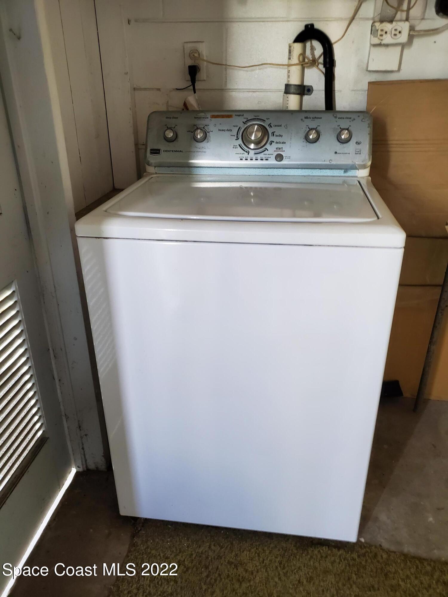 1507 Emory Lane Cocoa, FL 32922 - Photo 49 of 57 a utility room with dryer and washer