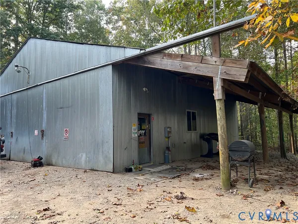 a backyard of a house with seating space