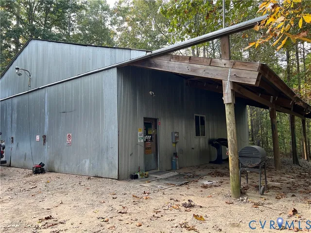 a backyard of a house with seating space