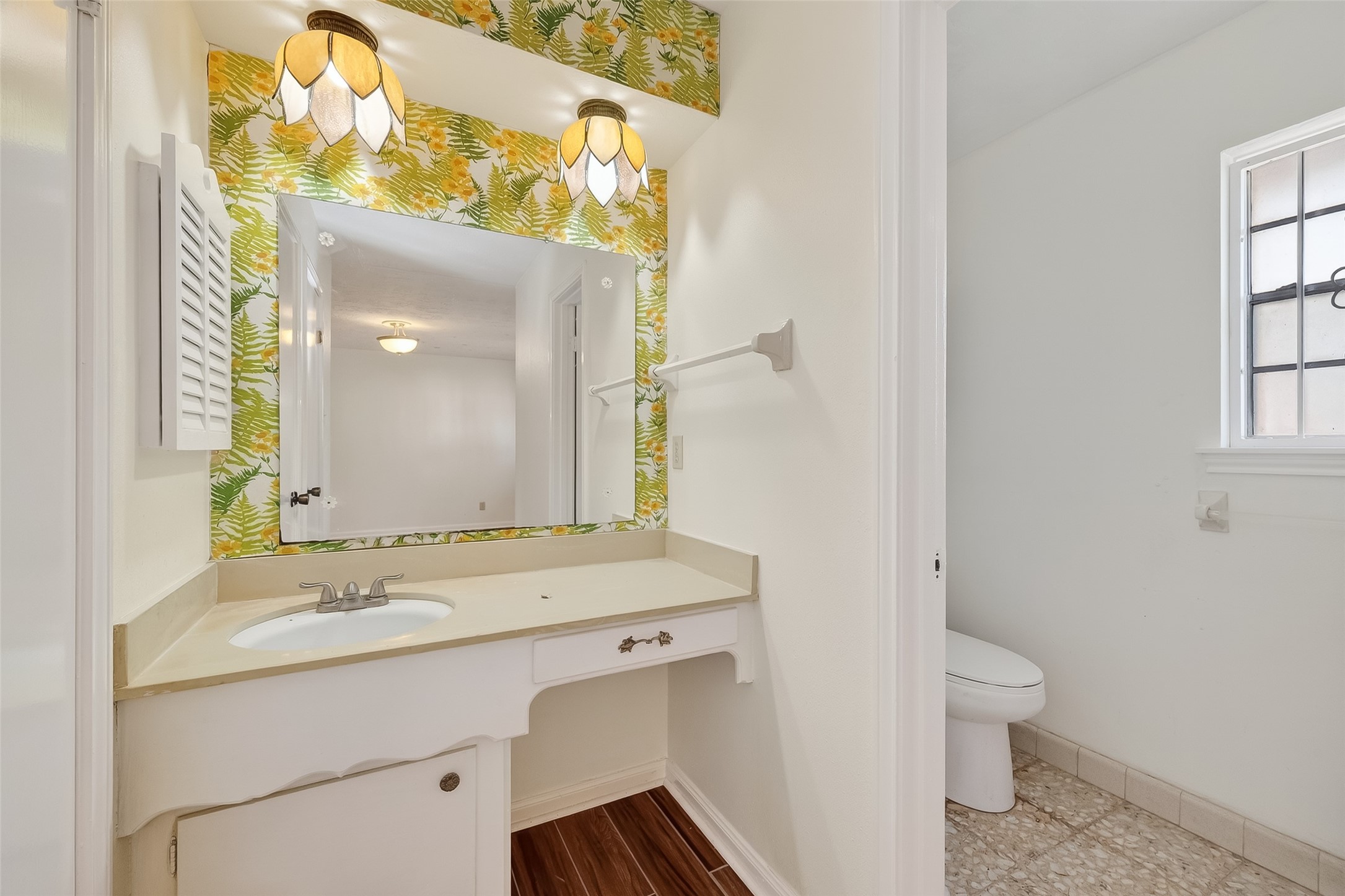 9218 Rowan Lane Houston, TX 77036 - Photo 28 of 32 a bathroom with a sink and a mirror
