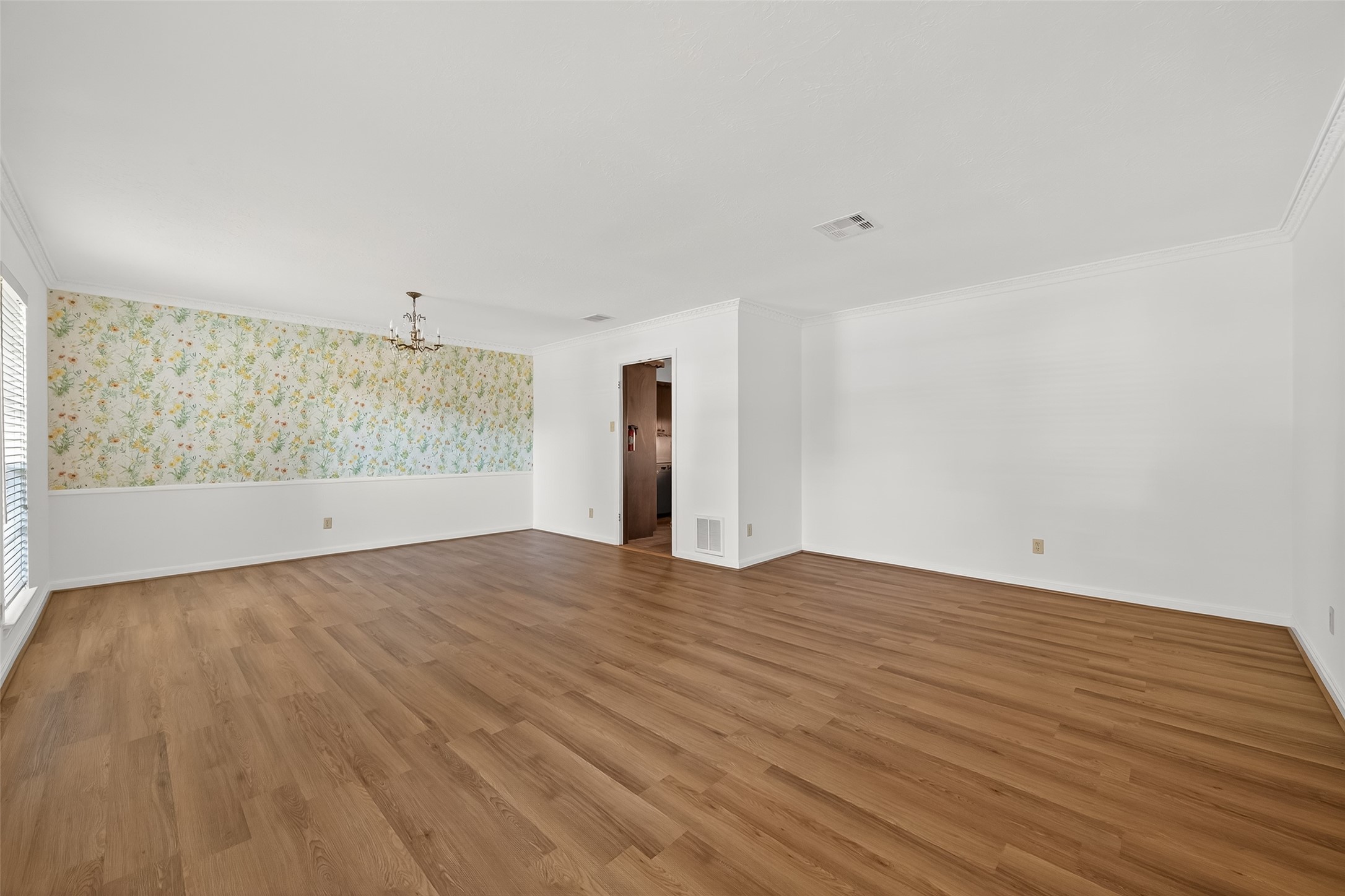 9218 Rowan Lane Houston, TX 77036 - Photo 3 of 32 a view of an empty room with a window