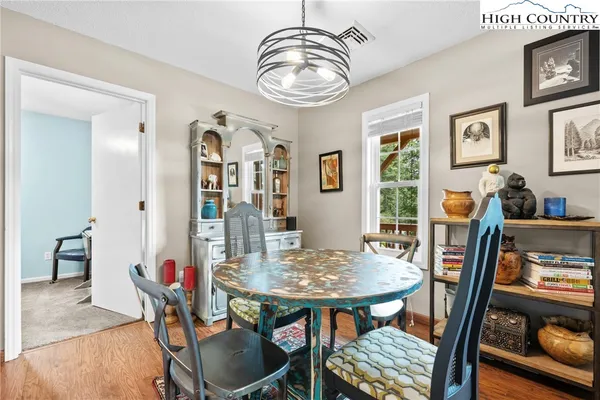 a view of a dining room with furniture