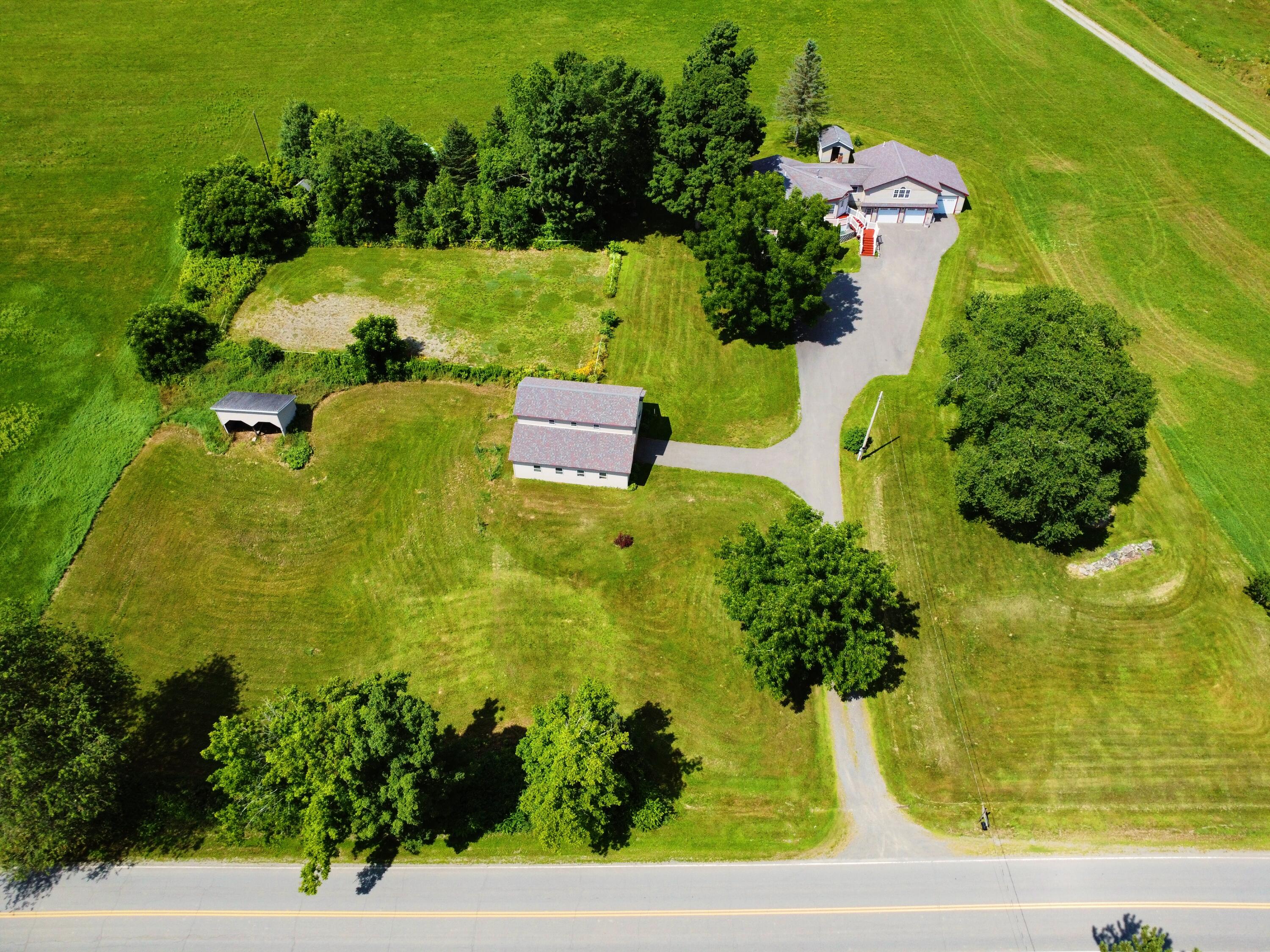 356 Range Road Dover Foxcroft, ME 04426 - Photo 18 of 57 FromRoadMidHeight_DJI_0359