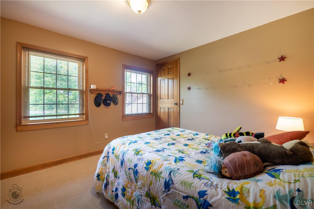 201 Ruth Road Bath, PA 18014 - Photo 11 of 49 a bedroom with a bed and a window