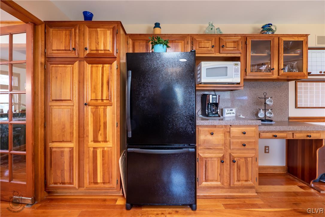 201 Ruth Road Bath, PA 18014 - Photo 3 of 49 a view of kitchen with wooden floor and staircase